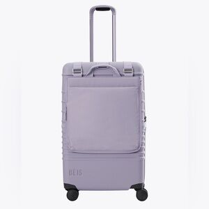 NEW. Beis Convertible Luggage Vest. NWT